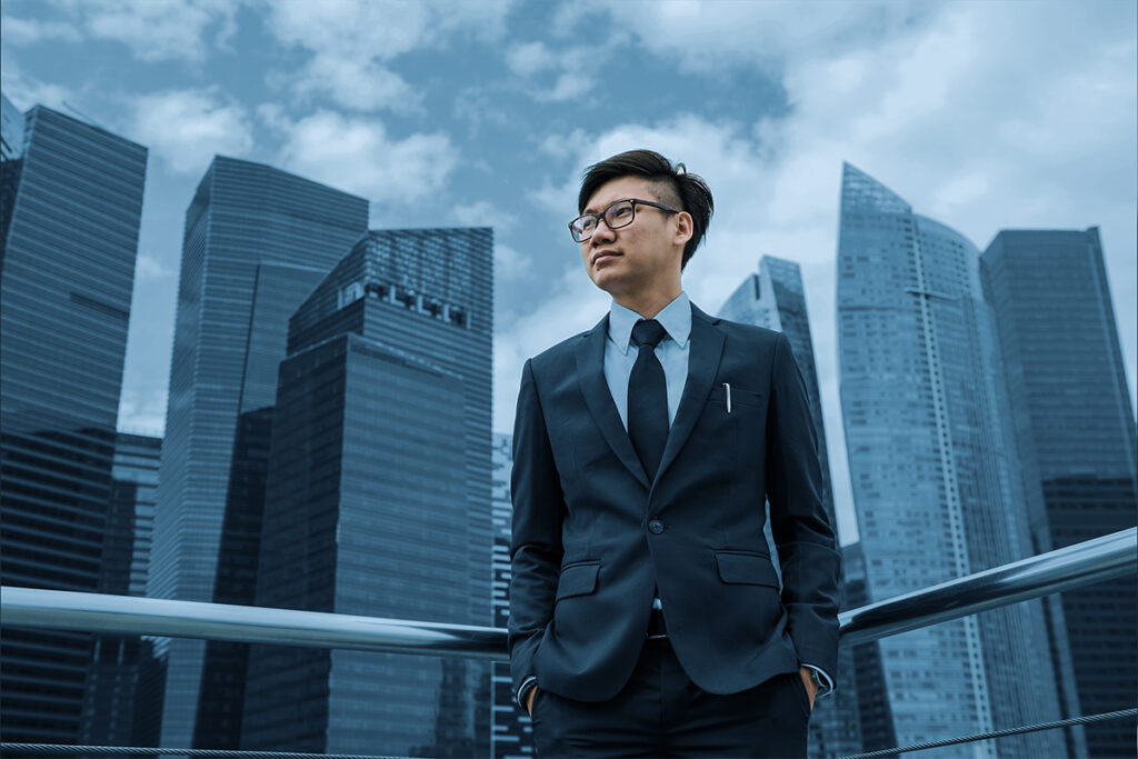 Man looking to the horizon in a city